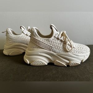 Steve Madden sneaker they are an off white color.